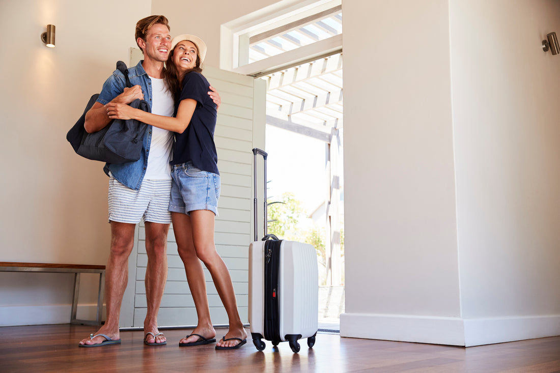 Couple Arriving at Summer Vacation Rental